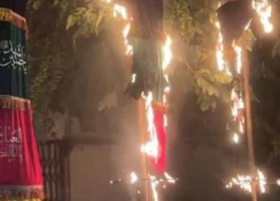 تصاویر و جزئیات حمله چند ناشناس به علم عزای سیدالشهدا(ع) در اصفهان ، واکنش مردم به لحظه آتش زدن علم و کتل سیدالشهدا(ع)